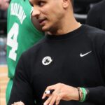 Celtics Coach Joins in Celebrating Baptism of New Free Agent Addition