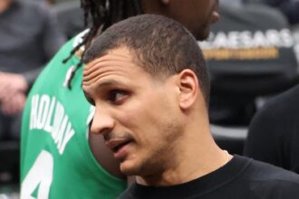 Celtics Coach Joins in Celebrating Baptism of New Free Agent Addition