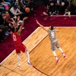 Here are a few engaging rewrites (no source mentioned):

– Donte DiVincenzo Drains a Dagger 3  
– Donte DiVincenzo Nails a Huge 3-Pointer  
– DiVincenzo Buries a Jaw-Dropping 3