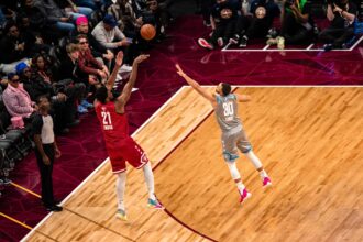 Here are a few engaging rewrites (no source mentioned):

– Donte DiVincenzo Drains a Dagger 3  
– Donte DiVincenzo Nails a Huge 3-Pointer  
– DiVincenzo Buries a Jaw-Dropping 3